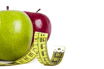 apple with tape measure, concept of healthy eating, lifestyle