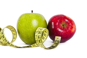 apple with tape measure, concept of healthy eating, lifestyle