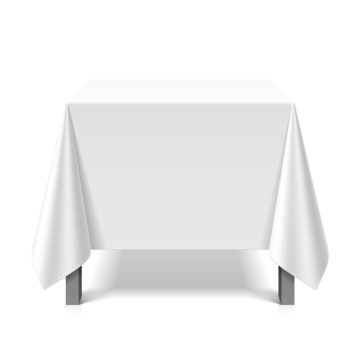 Square Table Covered With White Tablecloth