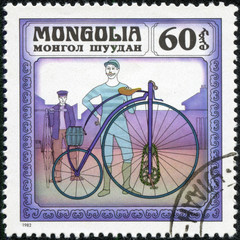 stamp printed by Mongolia, shows Two Men with Bicycles