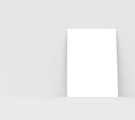 paper card on a white wall