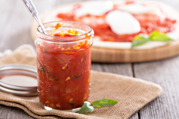 Pizza sauce in a jar selective focus