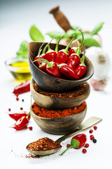chili peppers with herbs and spices