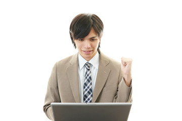 ガッツポーズのビジネスマン