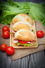 Sandwiches on a wooden background