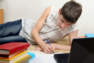 Fototapeta na wymiar Teenager doing Homework