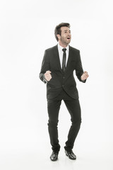 portrait of an expressive young man in suit on isolated backgrou