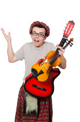 Funny scotsman with musical instrument isolated on white