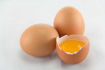 Broken egg isolated on white background