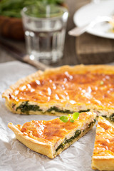 Quiche with arugula and bacon