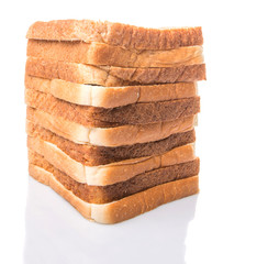 Whole Wheat Bread and Sandwich Bread Over White Background