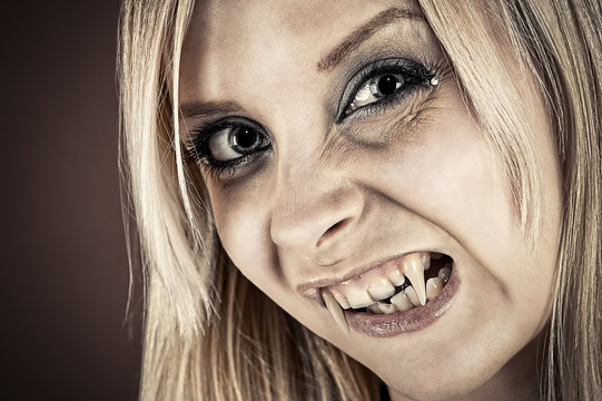 humorous portrait of a vampire with fangs