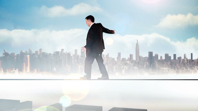 Businessman walking across tightrope with belief text