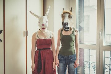 mask rabbit and horse mask lesbian couple