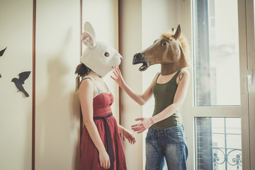 mask rabbit and horse mask lesbian couple