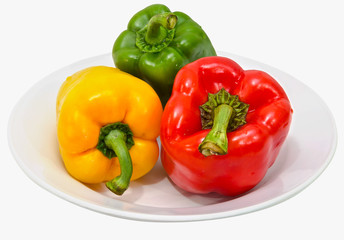 Three color peppers isolated on white