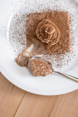 chocolate mousse portion  in white plate