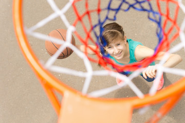 View through the net of a basketball shooter