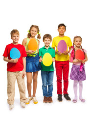 Children holding egg shape colourful cards