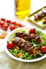 Yakitori with chicken liver, dried apricots, tomatoes