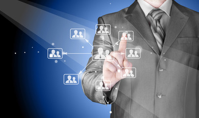Businessman pressing modern social buttons