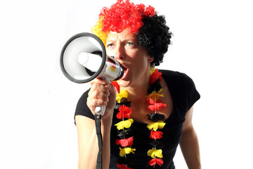 Fan feuert an mit Megafon