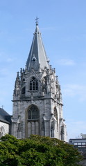 Fototapeta na wymiar beautiful steeple, with a blue sky background