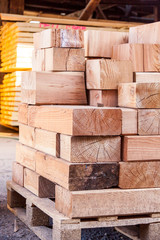 Wooden panels stored inside a warehouse