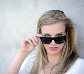 Naklejka premium Portrait of beautiful woman with glasses