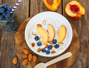 Granola with fresh organic blueberries, nectarines and almonds