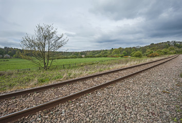 Fototapeta na wymiar View down railway track in english countryside