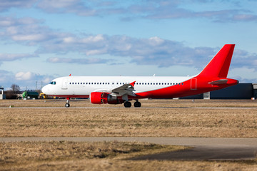 Passenger airliner taking off at an airport