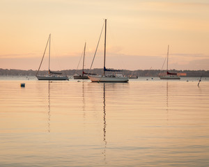 Sunrise Sailboats at Anchor