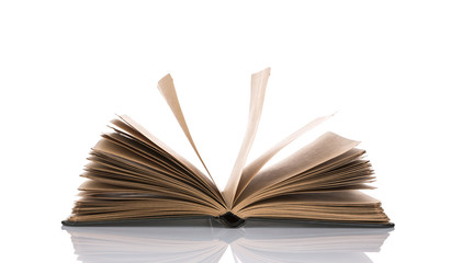 Open old book isolated on white background