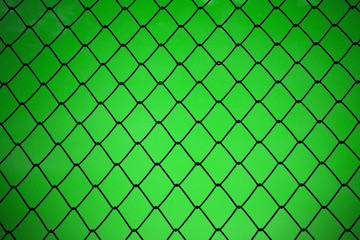 Fototapeta premium metallic net with green background