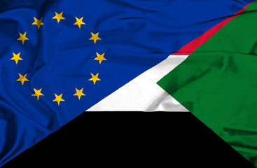 Waving flag of Sudan and EU