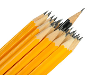 Celebratory pencil among usual pencils, isolated on white