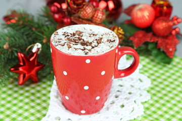 Obraz na płótnie Canvas Hot chocolate with cream in color mug,