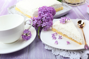 Fototapeta na wymiar Delicious dessert with lilac flowers