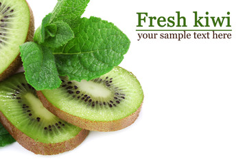Naklejka na ściany i meble Kiwi fruit with mint isolated on white