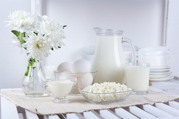 Still life with tasty dairy products on table