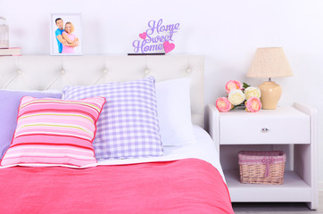 Comfortable soft bed in room