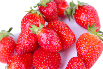 Ripe sweet strawberries isolated on white