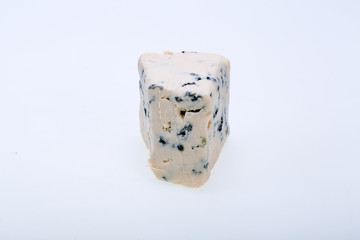 piece of blue cheese on white background