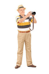 Mature man taking a picture with camera