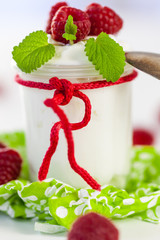 Raspberries and yoghurt or clotted cream