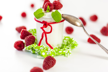 Raspberries and yoghurt or clotted cream