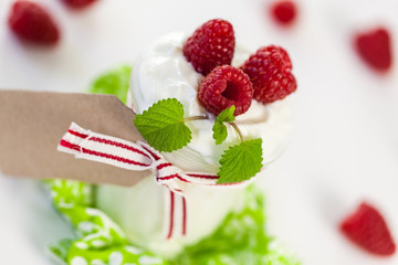 Raspberries and yoghurt or clotted cream