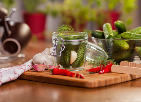Preparing pickled cucumbers in the kitchen