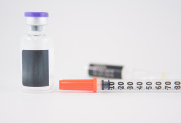 Disposable syringe and injection vials